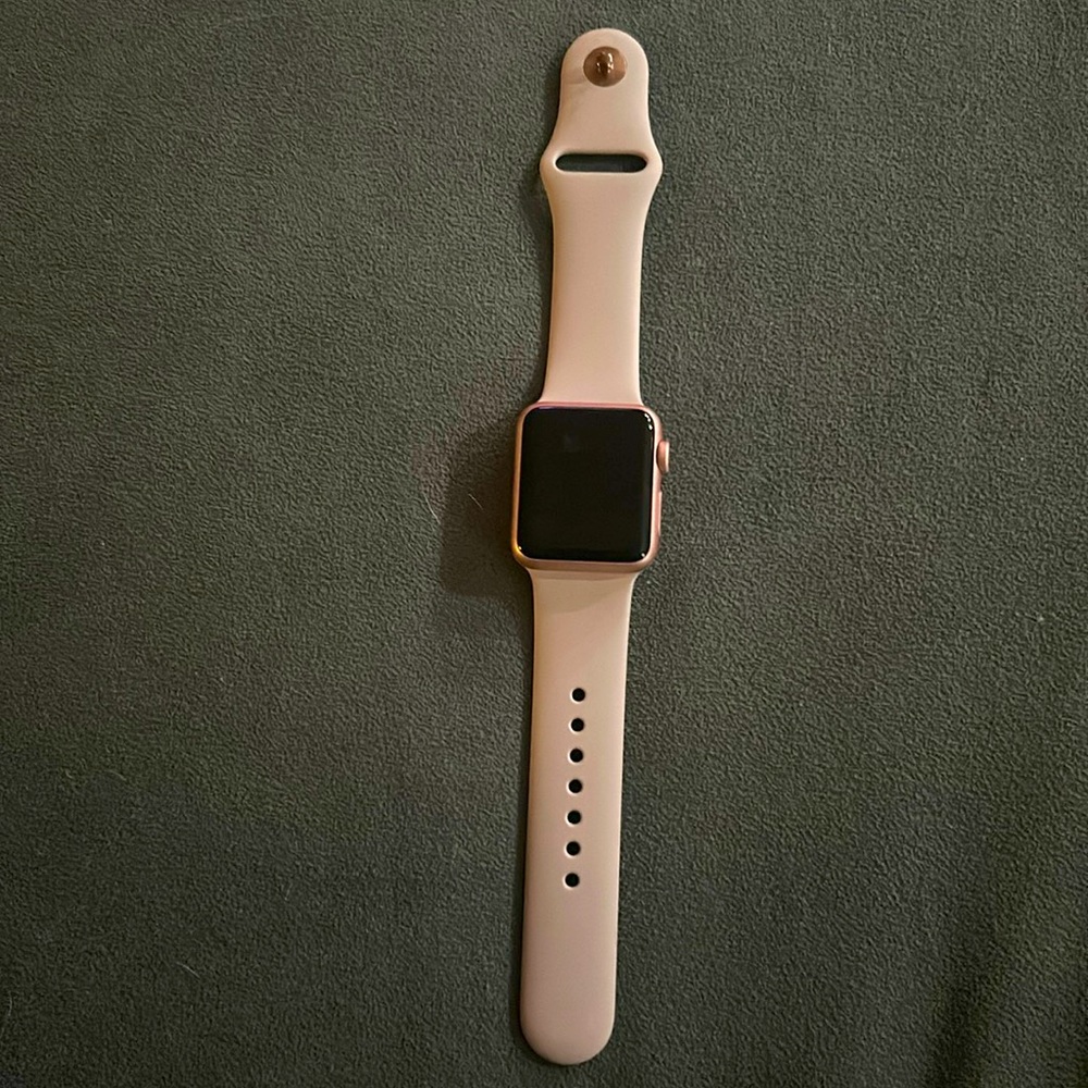 Apple Watch 7000 series. 38 mm. Purple watch band.